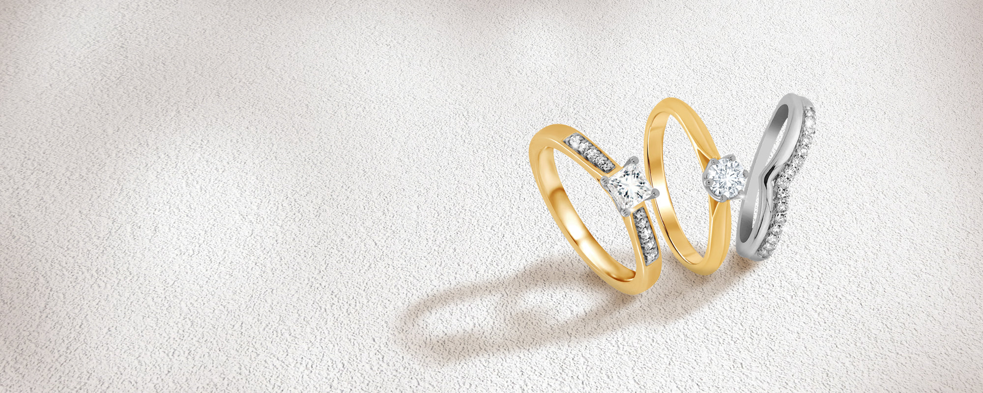 eas gold and platinum diamond engagement rings