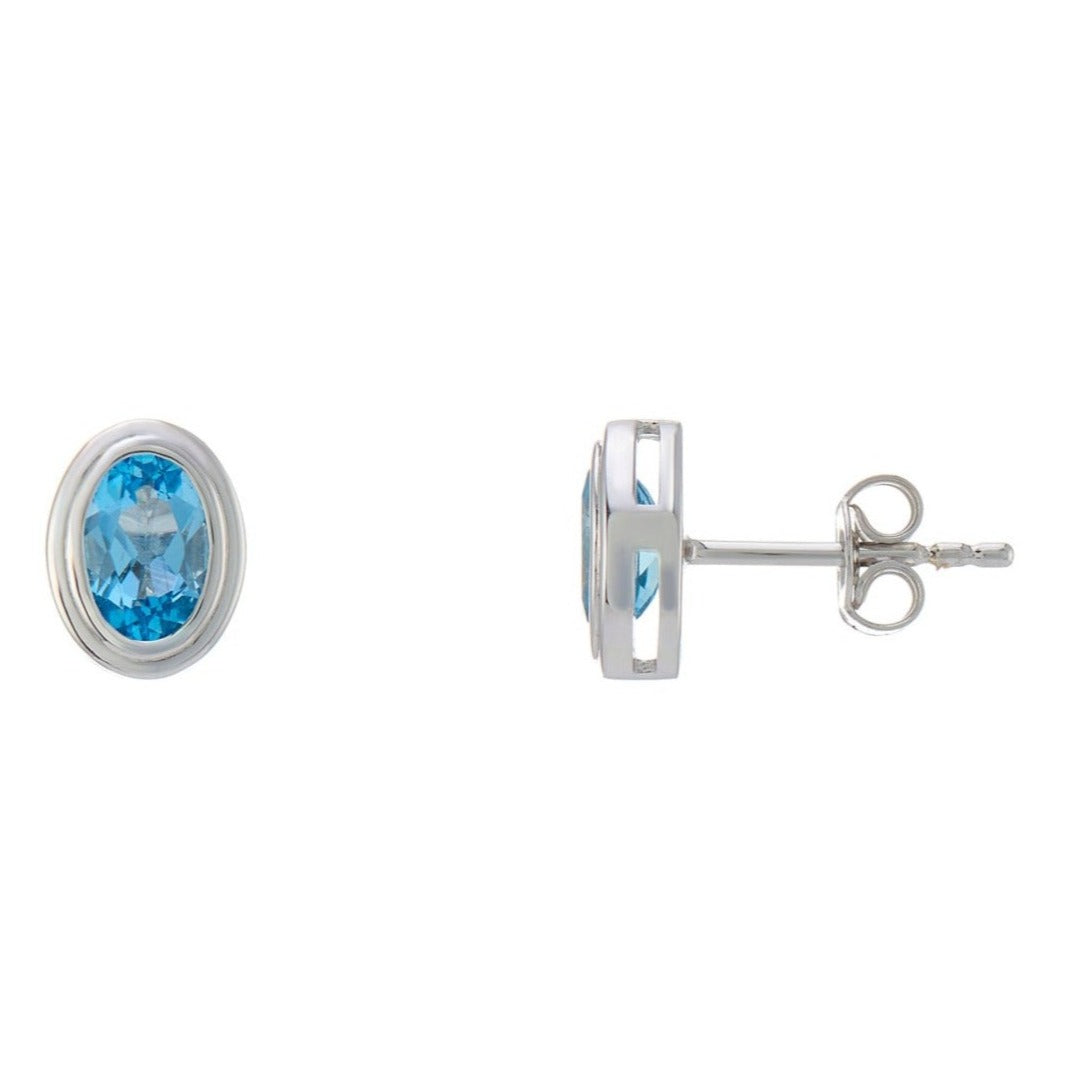 9ct white gold 6x4mm oval rub over set blue topaz stud earrings